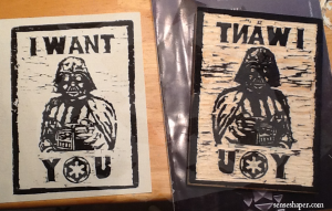 A side by side comparison of my Darth Vader I Want You propaganda woodcut block and print.