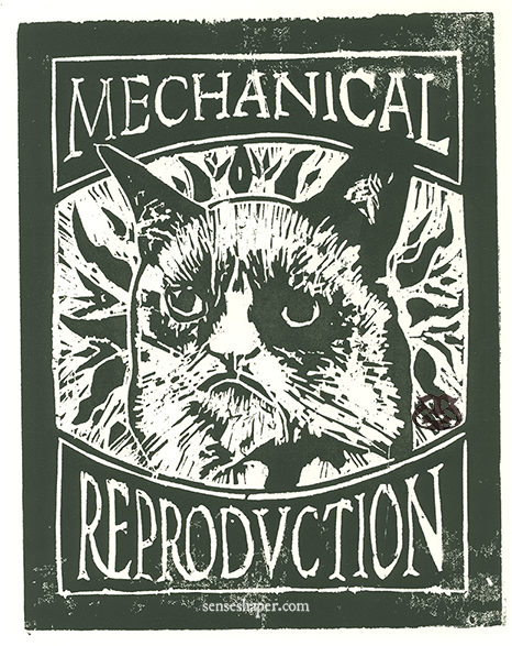 Woodcut print, "Benjaminian Grumpy Cat: Mechanical Reproduction," from choice pine woodblock and on Antique Laid cotton blend paper.
